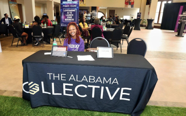 Students smiling and interacting at The Alabama Collective Innovation Power Hours booth.